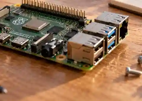 Single-board computer with loose screws and a screwdriver on a warm workshop bench